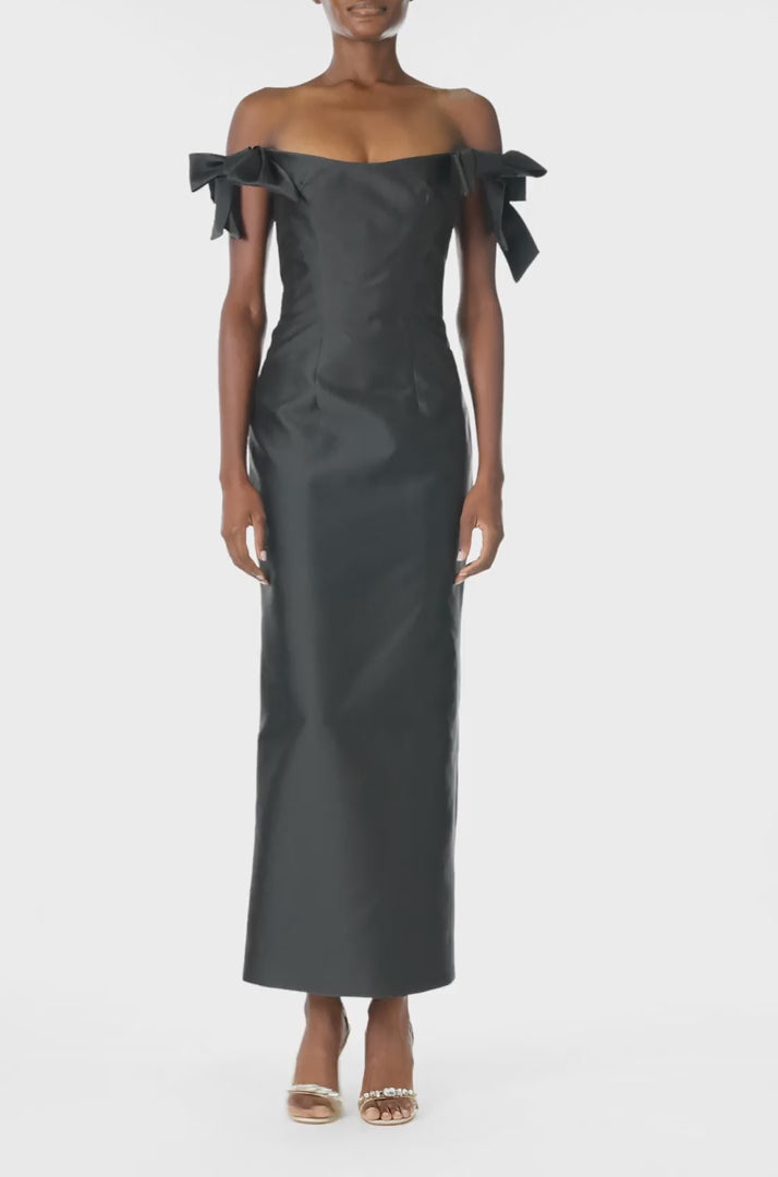 Monique Lhuillier Fall 2024 off the shoulder sheath dress with bow sleeves in Noir mikado - video.