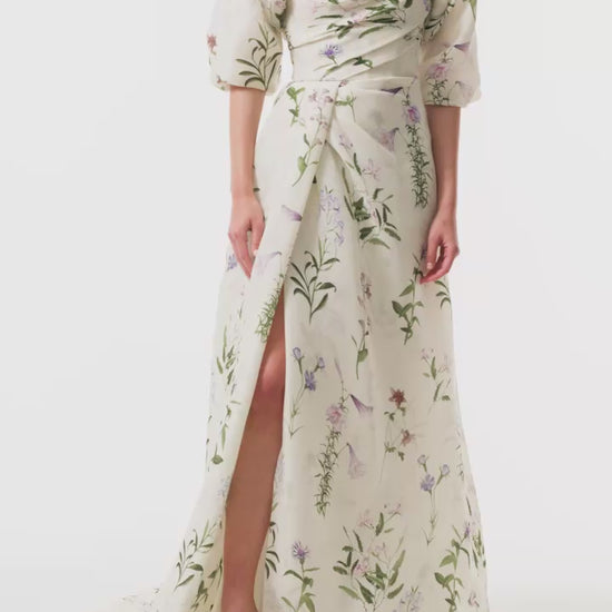 Monique Lhuillier Fall 2025 high neck bolero in floral gazar shown over the matching strapless gown - video.