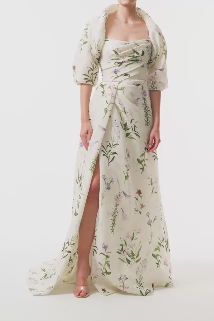 Monique Lhuillier Fall 2025 high neck bolero in floral gazar shown over the matching strapless gown - video.