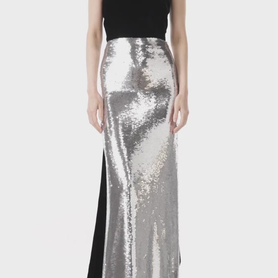 Monique Lhuillier strapless gown in silver sequins and noir velvet.