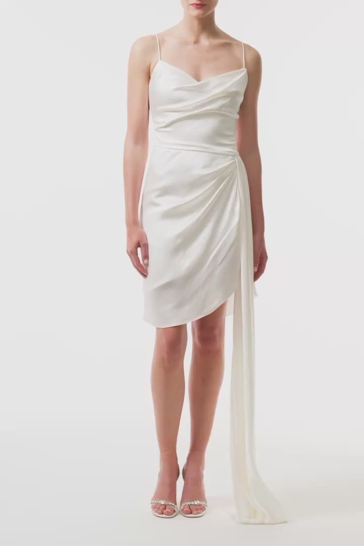 Silk white satin mini dress with asymmetric hem, side sweeping train and spaghetti straps - video.