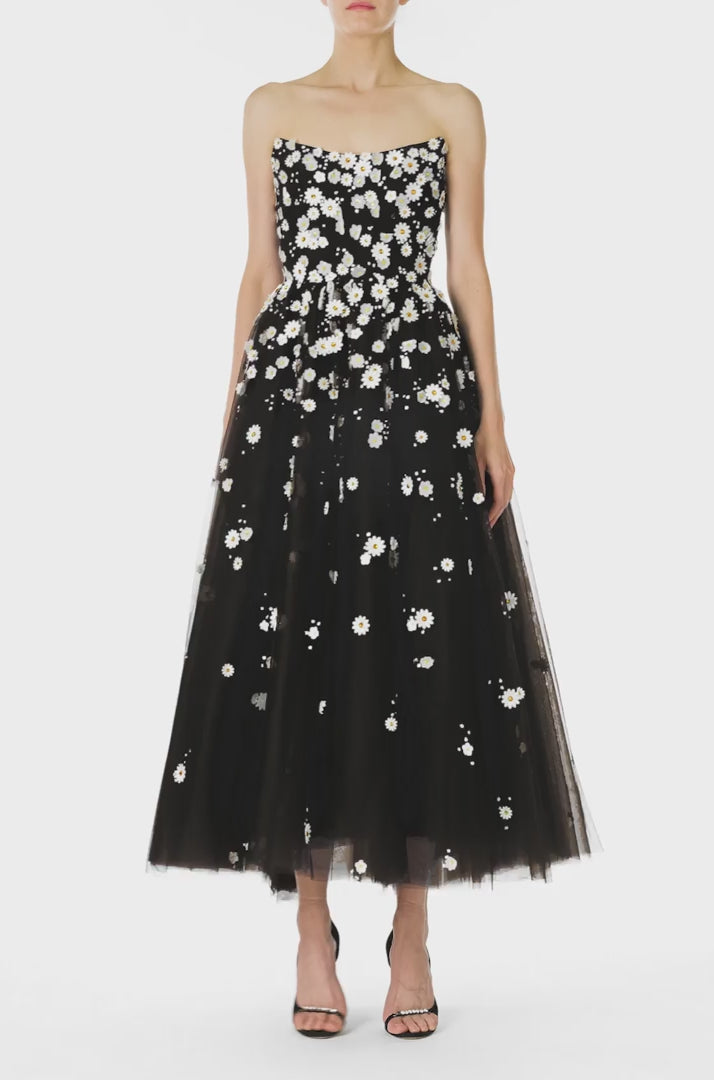 Monique Lhuillier Spring 2025 Noir tulle cape with Daisy embroidery and hook and eye closure at front of neckline - video.