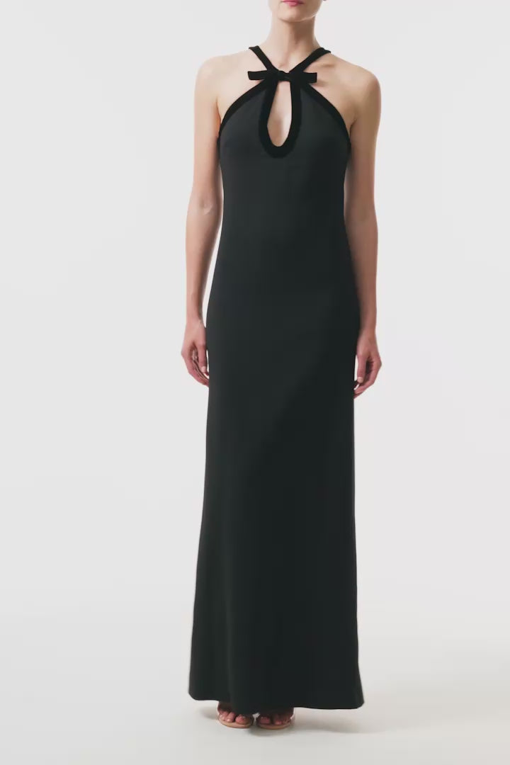 Monique Lhuillier Fall 2025 Noir Key-hole halter gown with velvet trim in Lightweight Silk Wool Suiting - video.