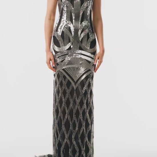 Monique Lhuillier Fall 2025 sleeveless, floor length gown in noir and silver deco embroidery - video.