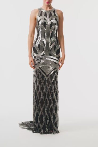 Monique Lhuillier Fall 2025 sleeveless, floor length gown in noir and silver deco embroidery - video.