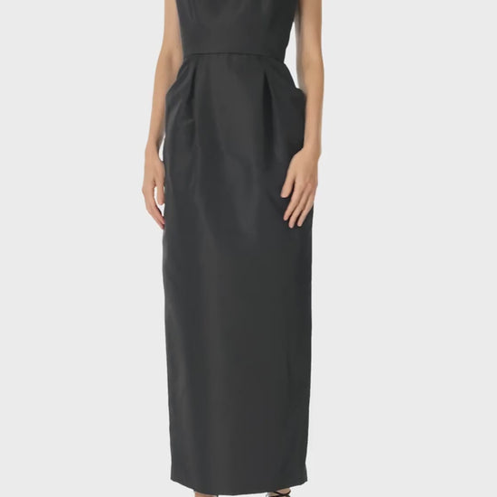 Monique Lhuillier Fall 2024 Sleeveless, scoop neck cocktail dress with pockets and pearl embroidered neckline in noir silk faille - video.
