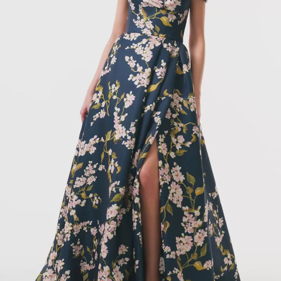 Monique Lhuillier Fall 2025 Ocean/Multi Wisteria Printed Gazar draped off-the-shoulder ballgown - video.