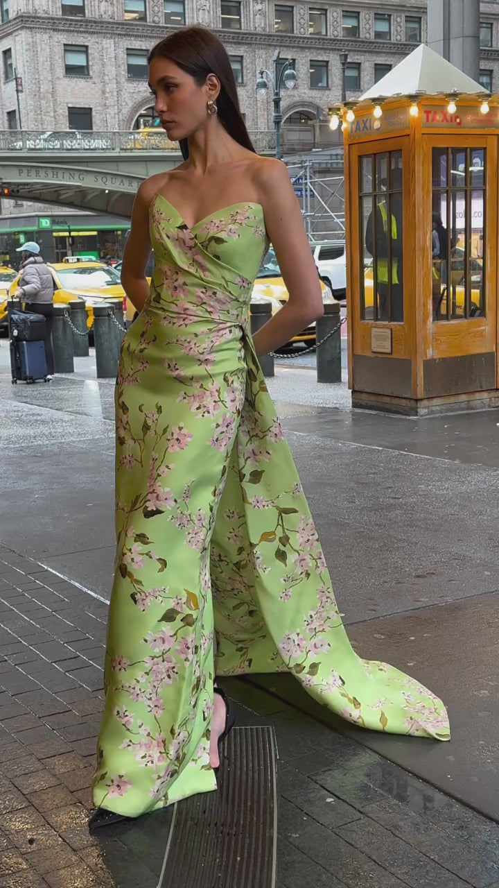 Monique Lhuillier Fall 2025  Draped Bodice Column Gown with Train in Celedon/Multi Wisteria Printed Gazar - video.