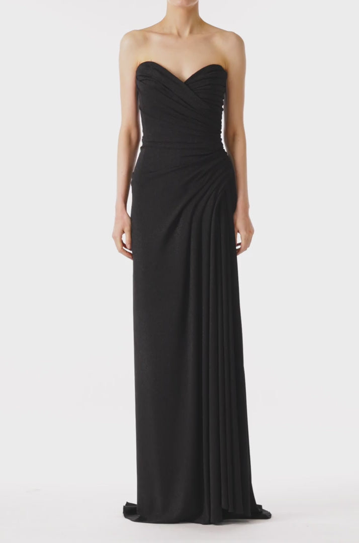 Monique Lhuillier Spring 2023 strapless Noir gown with sweetheart neckline and draping with high slit - video.
