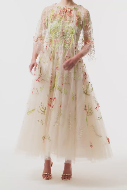 Monique Lhuillier Spring 2025 tulle capelet in Prosecco Multi colored embroidered tulle - video.