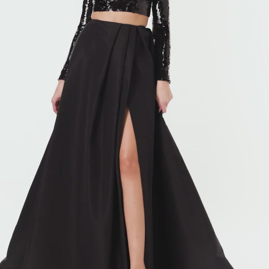 Monique Lhuillier black silk faille ball skirt with high leg slit.