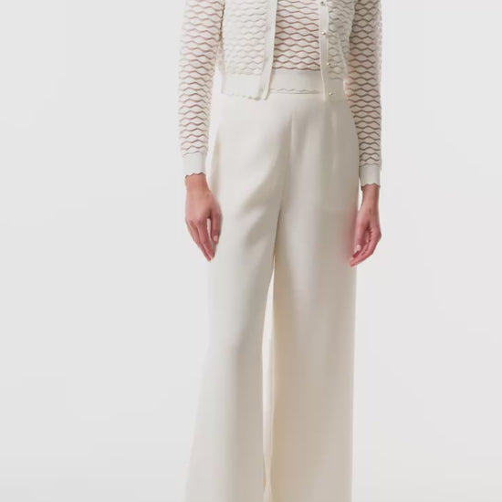 Monique Lhuillier Fall 2025 Ivory Viscose scallop knit cardigan with matching shell - video.