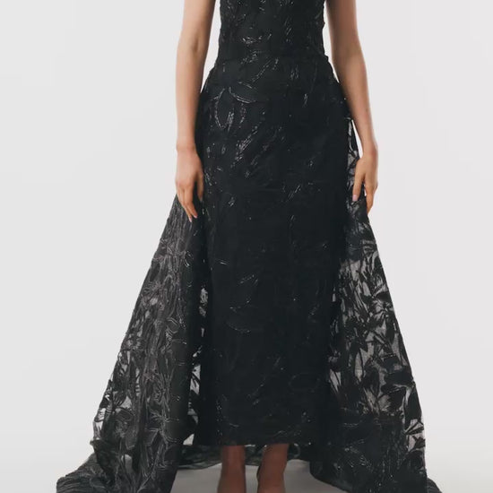 Monique Lhuillier Spring 2025 strapless gown with train in noir embroidery - video.
