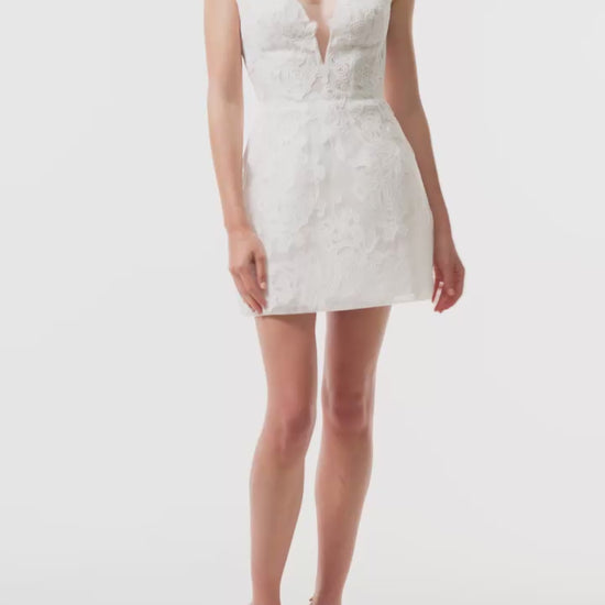 Strapless silk white lace mini dress with sweetheart neckline and illusion tulle inset - video.