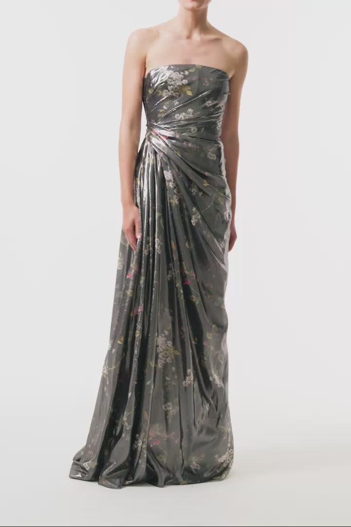 Monique Lhuillier Fall 2025 strapless gown with detached neck scarf in metallic floral printed lame fabric - video.