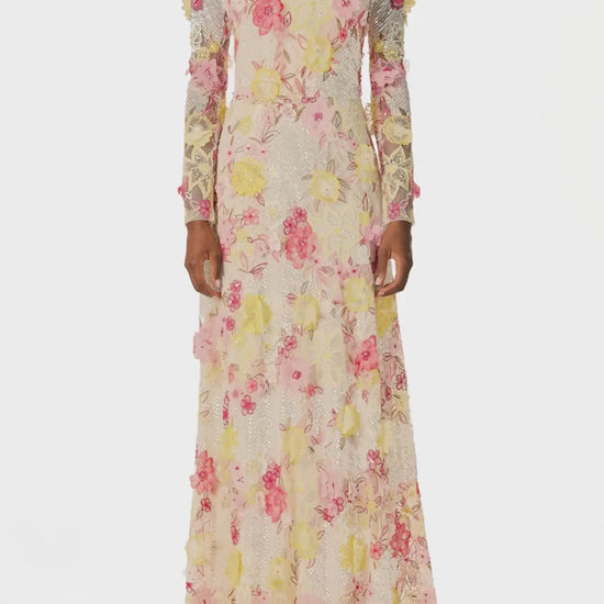 Monique Lhuillier Spring 2025 long sleeve gown in floral, embroidered lace in ecru yellow and pinks - video.