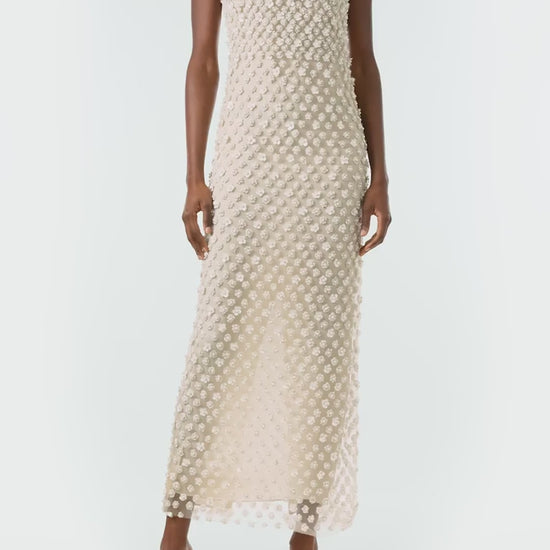Monique Lhuillier Fall 2024 sleeveless, pearl embroidered sheath with jewel neckline - video.