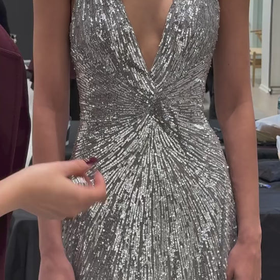 Monique Lhuillier Fall 2025 V-neck gown in silver embroidered tulle - Instagram video.