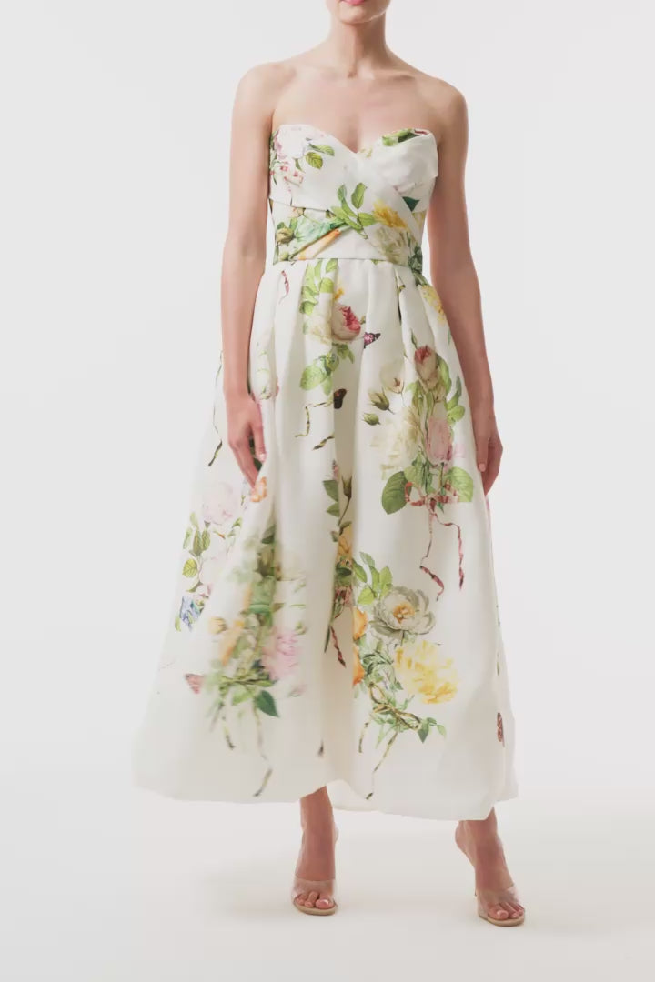 Strapless, tea-length dress in floral printed gazar with draped bodice and pockets - video.