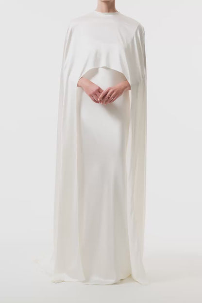Silk white satin "Viola" cape with long back train and rounded front.  Shown over the Viola silk white satin floor length gown - video.