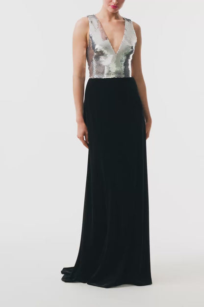 Monique Lhuillier Fall 2025 v-neck gown with silver sequin bodice and noir velvet skirt - video.