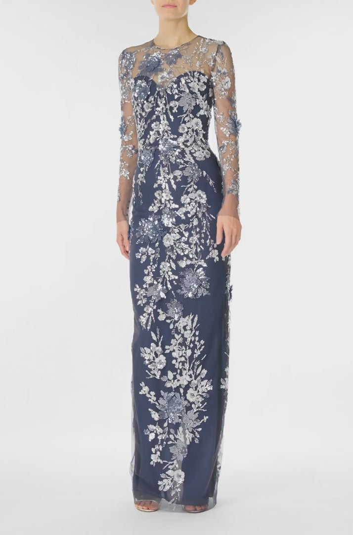 Monique Lhuillier Spring 2025 long sleeve, sequin tulle gown with illusion neckline and column skirt in navy multi colors - video.