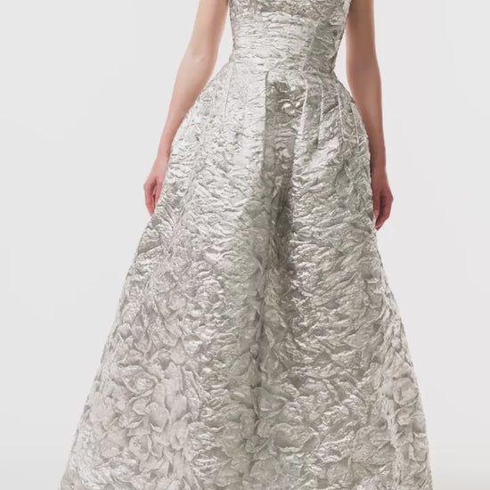 Monique Lhuillier Fall 2025 strapless ballgown in silver metallic jacquard - video.