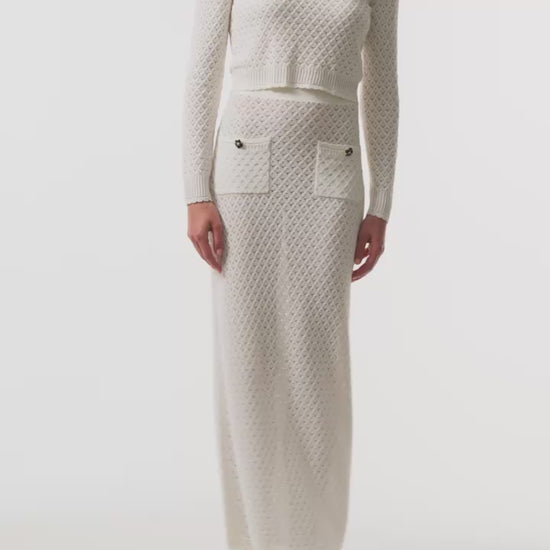 Monique Lhuillier Fall 2025 cotton diamond lace knit long sleeve top and midi skirt- video.